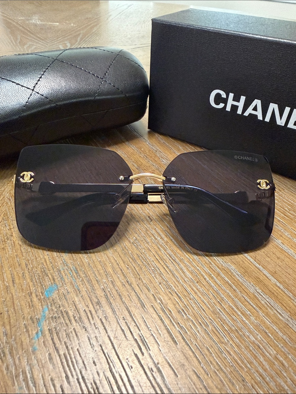 CHANEL Black Rimless Square Sunglasses with Gold Accents - Picture 3 of 9